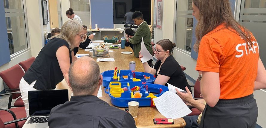 students work on project at table